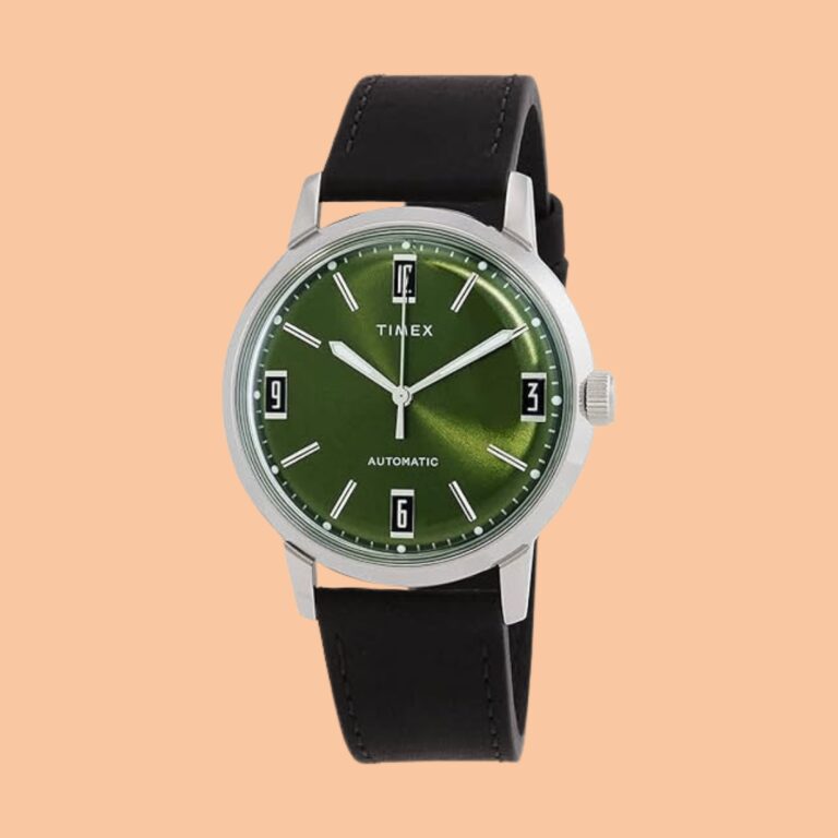 Timex Marlin Automatic 40mm leather strap watch in stainless steel on a wooden surface