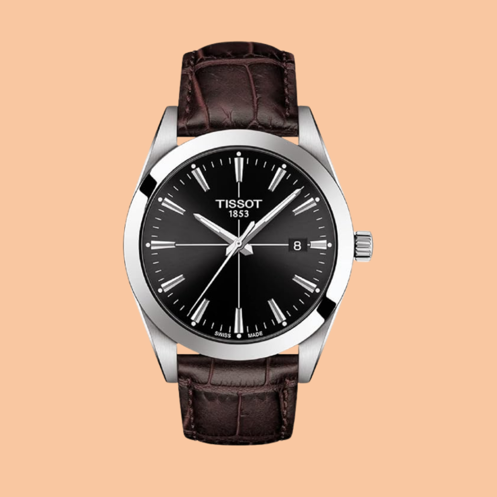 Tissot Gentleman stainless steel men’s dress watch with leather strap on a desk