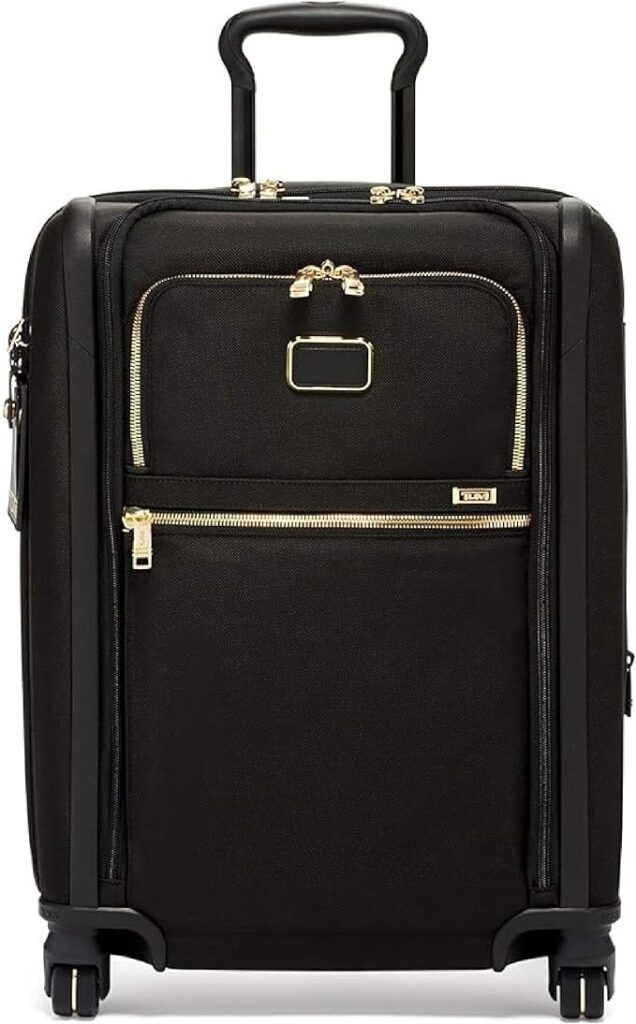 TUMI Alpha Dual Access Carry-On with USB-C charging port, dual-access lid, and 4-wheel spinner design for modern travel