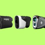 Golfer using a high-precision rangefinder on a professional golf course in 2025.